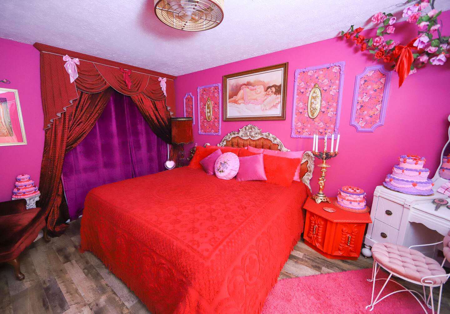 Pink bedroom with red bedding